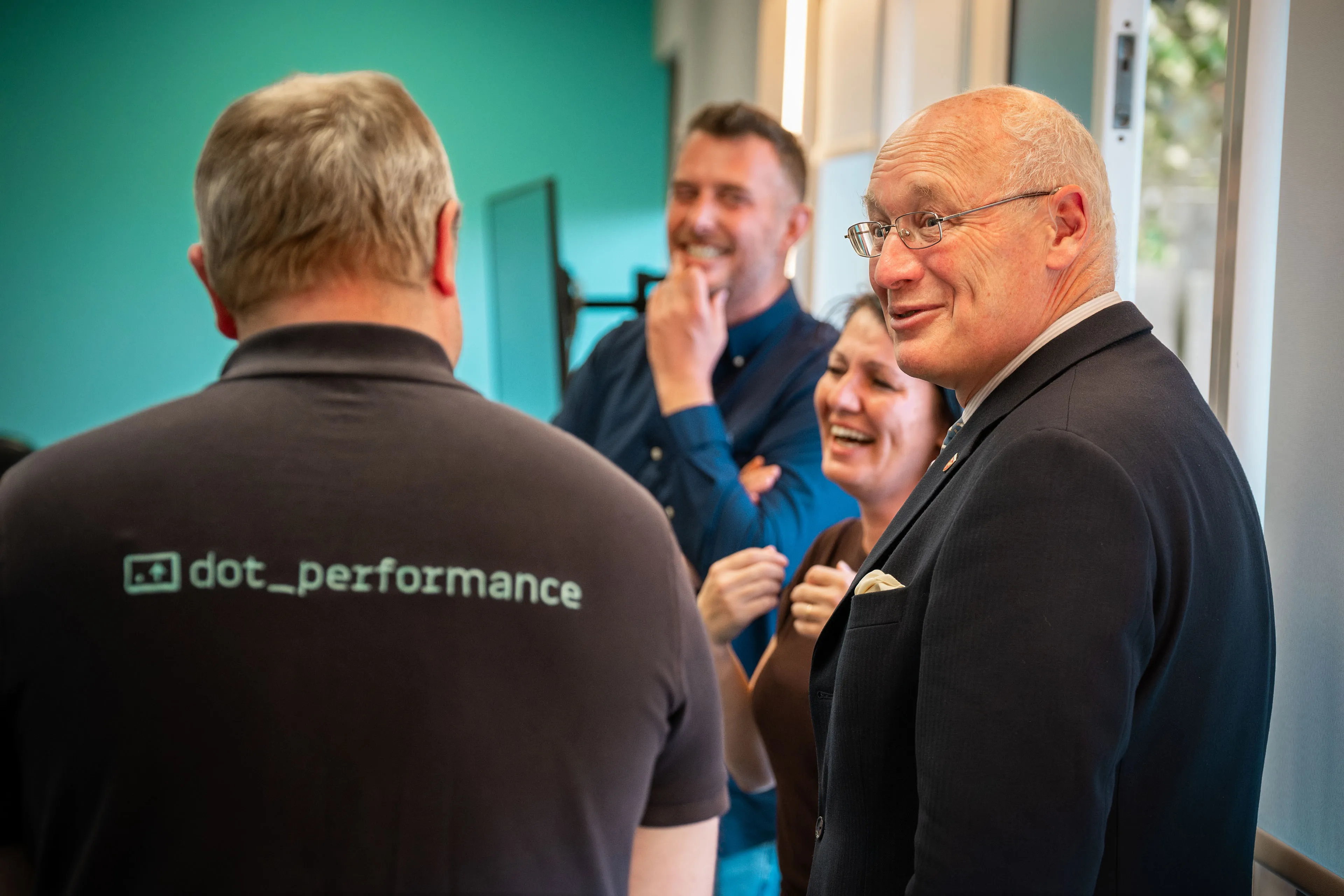 Lieutenant General Sir John Lorimer KCB DSO MBE telling a funny story as Raluca Matei and Andy Orton laugh in the background