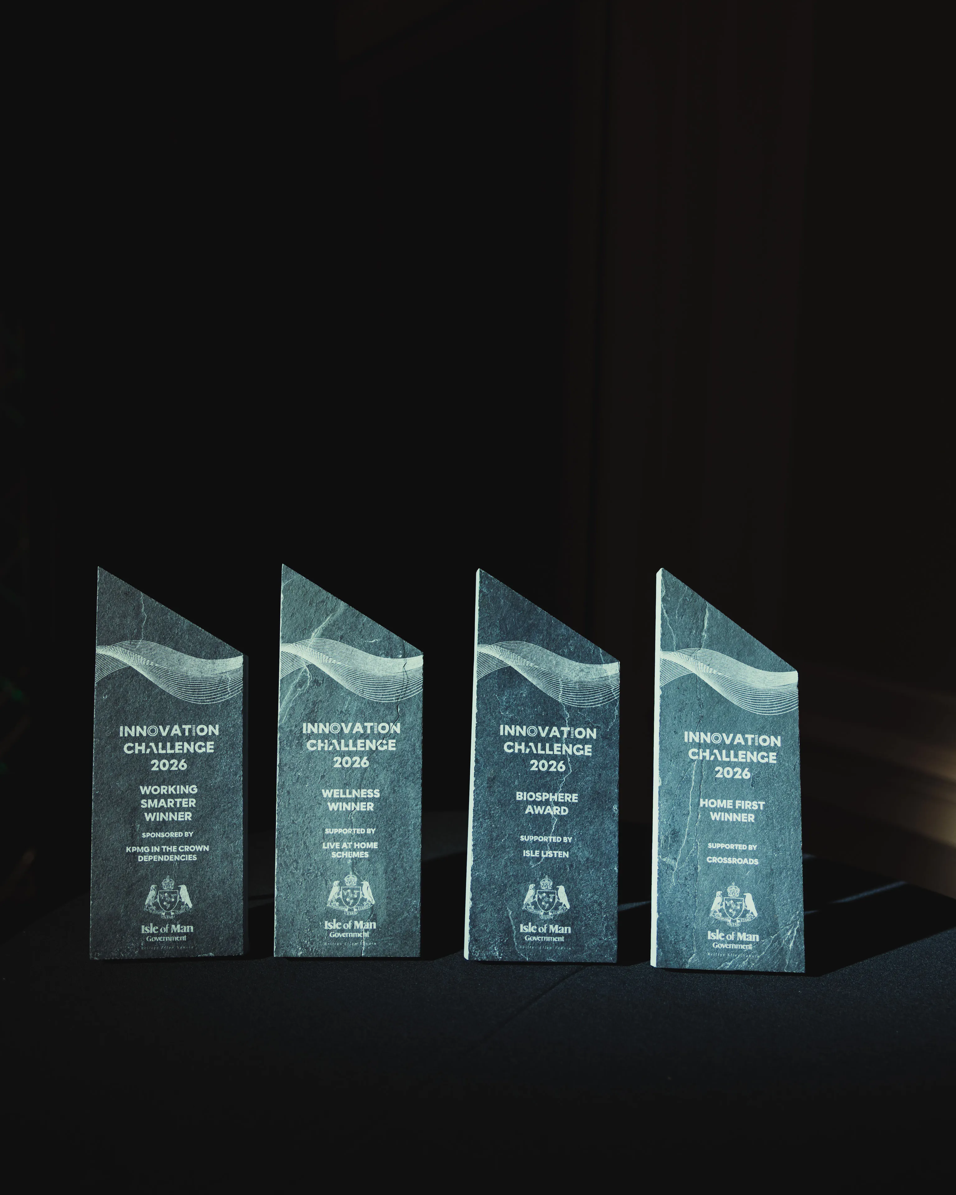 Four slate Innovation Challenge 2026 trophies for the Working Smarter, Wellness, Biosphere and Home First categories