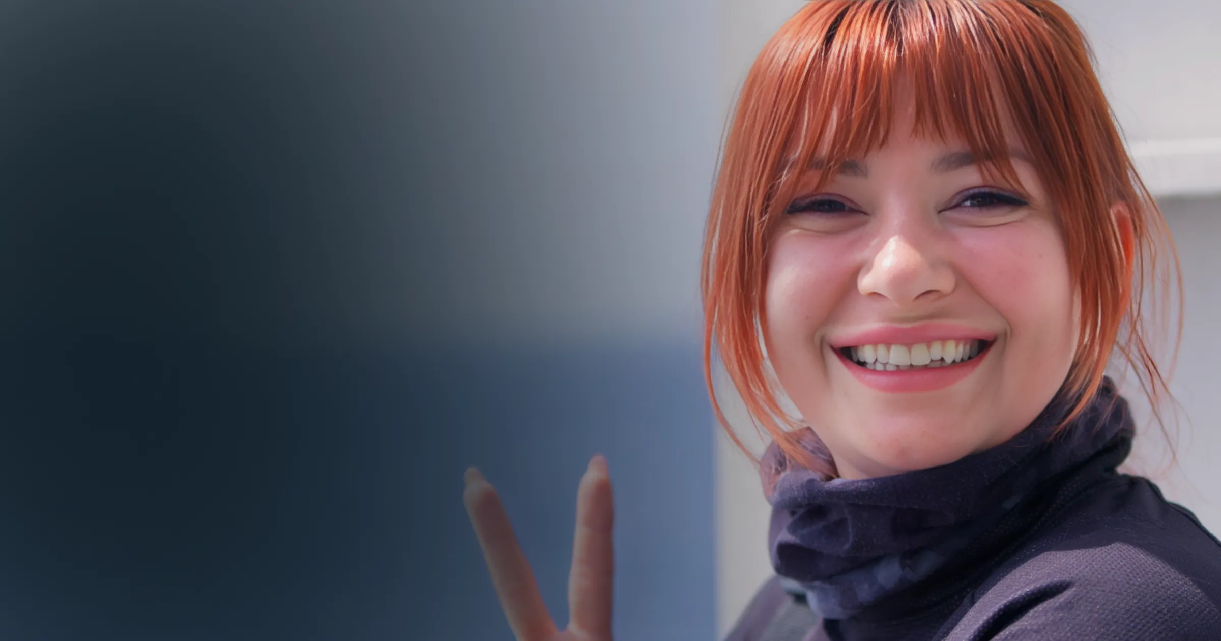 Passenger onboard the Steampacket flashes a peace sign before disembarking for the TT.
