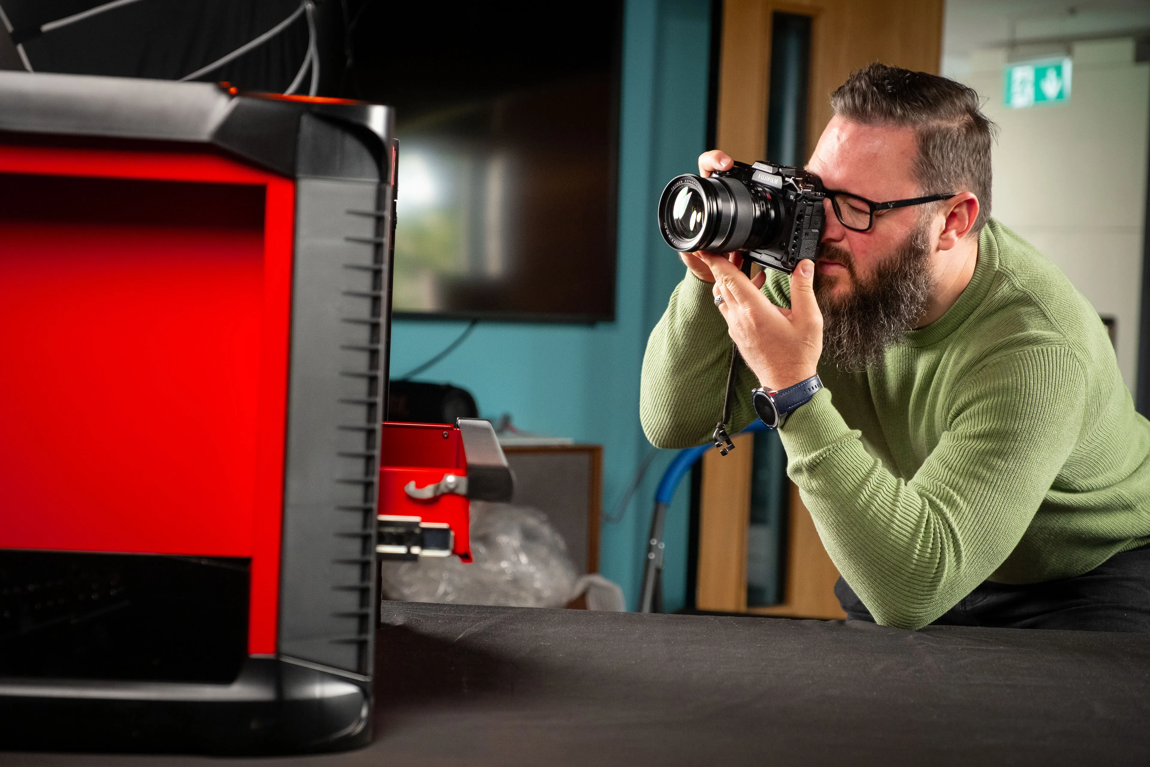Nico van Loggerenberg photographing the Milwaukee STC30-1 Toolbox prize with a Fujifilm X-H2S camera in the DotPerformance Media Studio