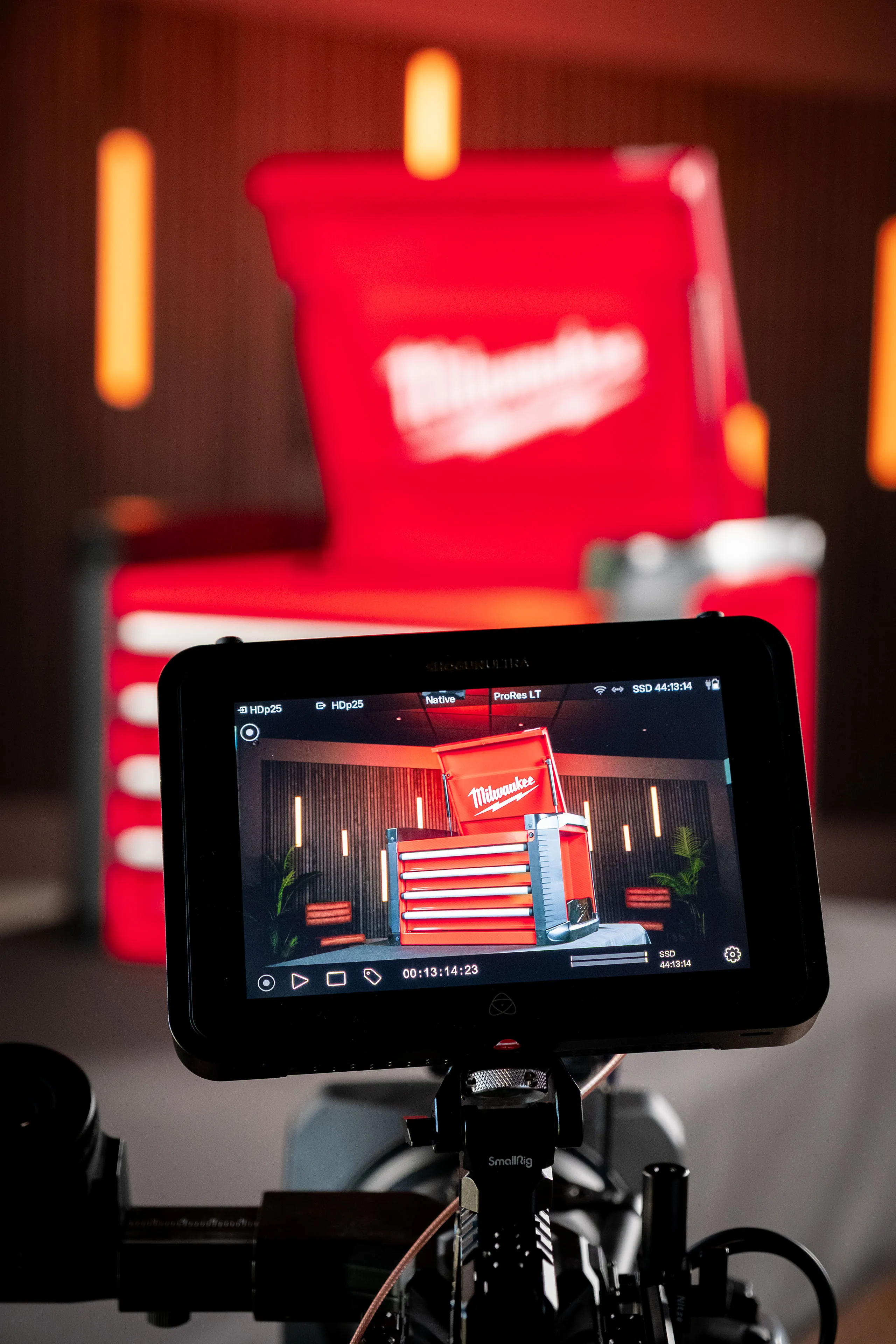 Close-up of the Atomos Shogun Ultra monitor mounted on the Blackmagic Ursa Mini camera, showing the framed shot of the Milwaukee STC30-1 Toolbox prize