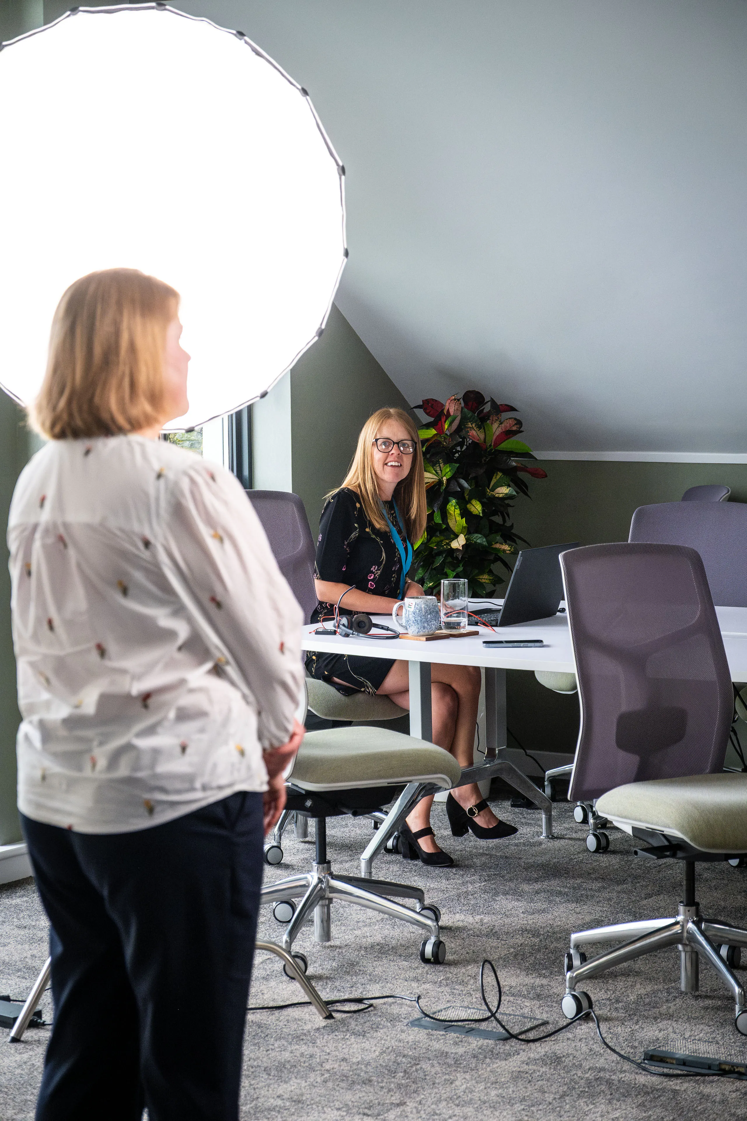 Vicky Mackie looking on while helping with the planning and transitions during the Boal & Co portrait sessions.