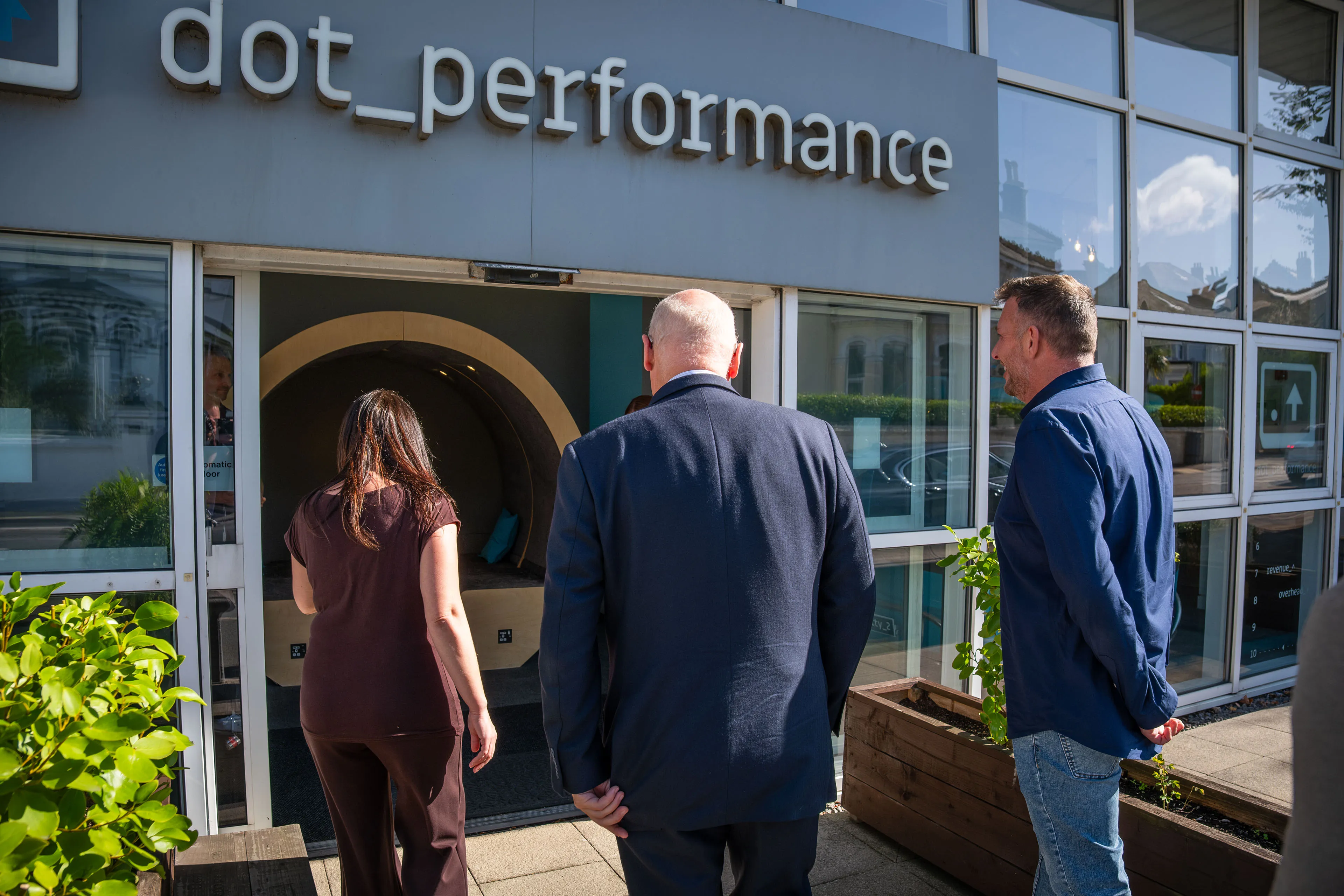 Andy Orton and Raluca Matei ushering Lieutenant General Sir John Lorimer KCB DSO MBE through the DotPerformance entrance