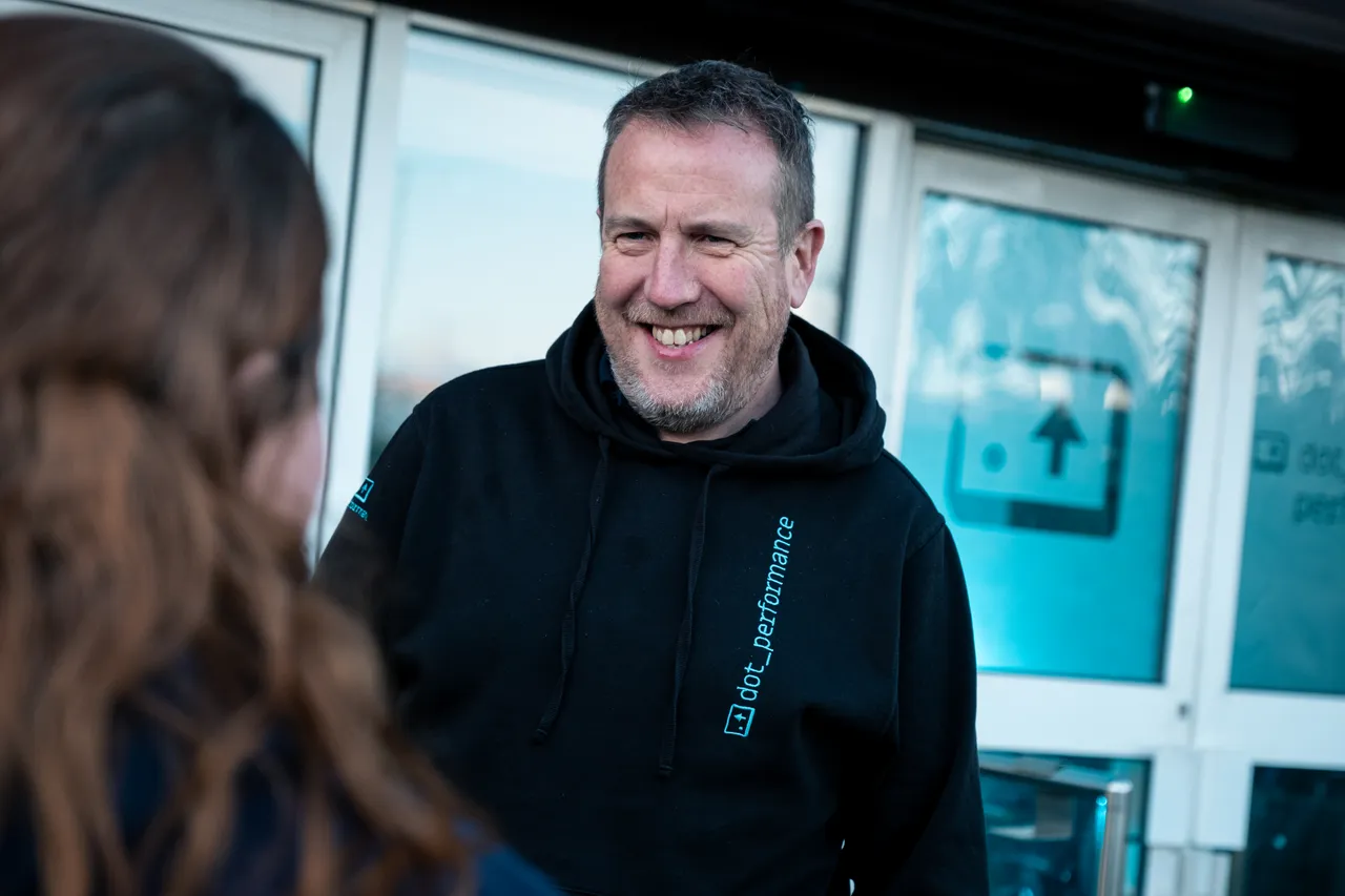 Simon Head of digital at Dot performance smiling outside building