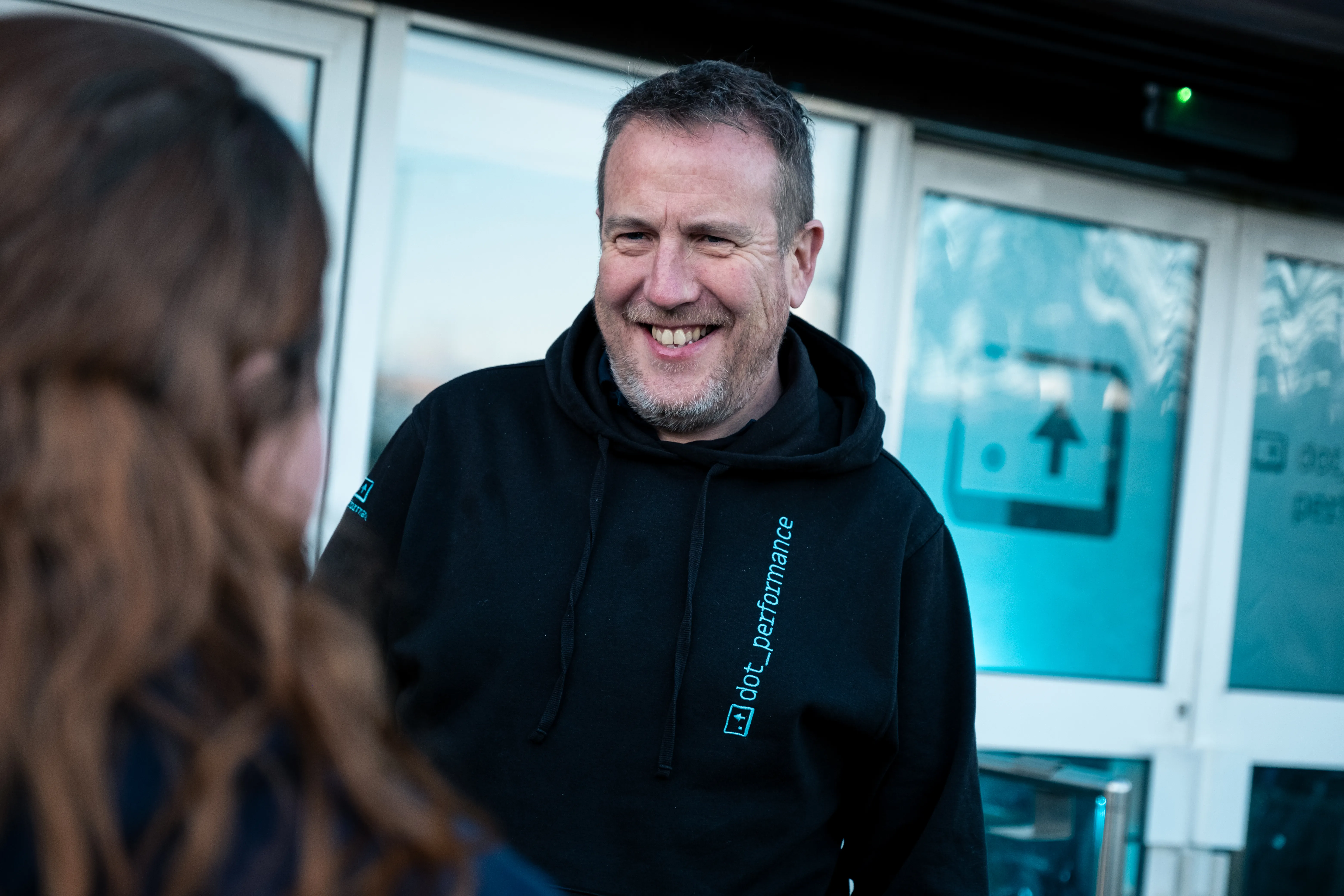 Simon Head of digital at Dot performance smiling outside building
