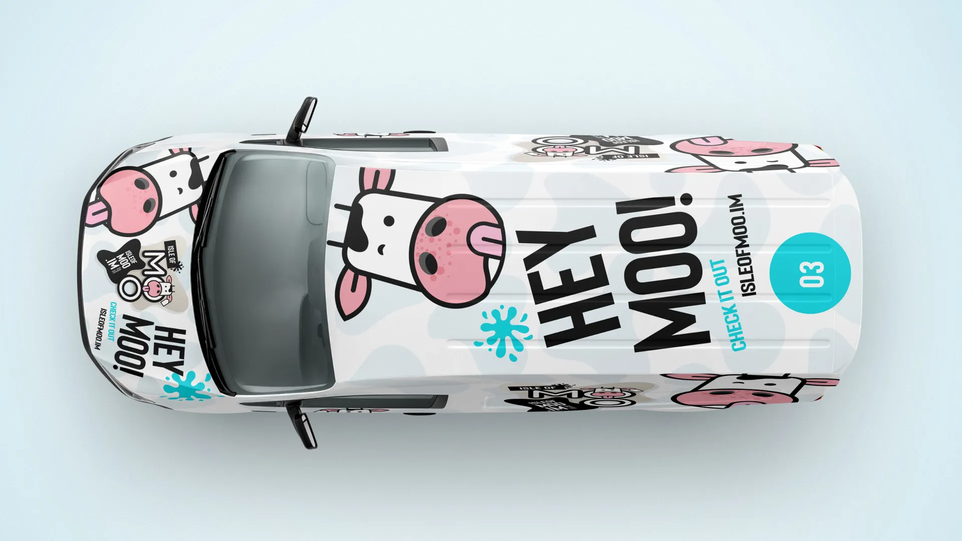 Overhead view of the Isle of Moo full vehicle wrap designed by DotPerformance for Isle of Man Creamery, showing the cartoon cow character and Hey Moo branding across the roof