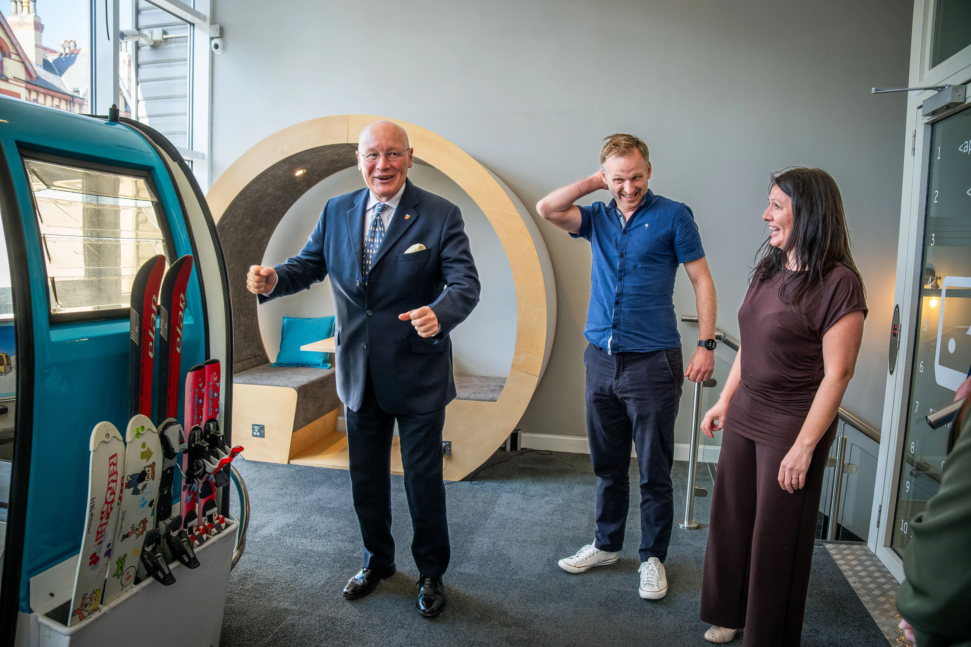 Lieutenant General Sir John Lorimer KCB DSO MBE telling Raluca Matei and John Beaty a funny story by the gondola pod