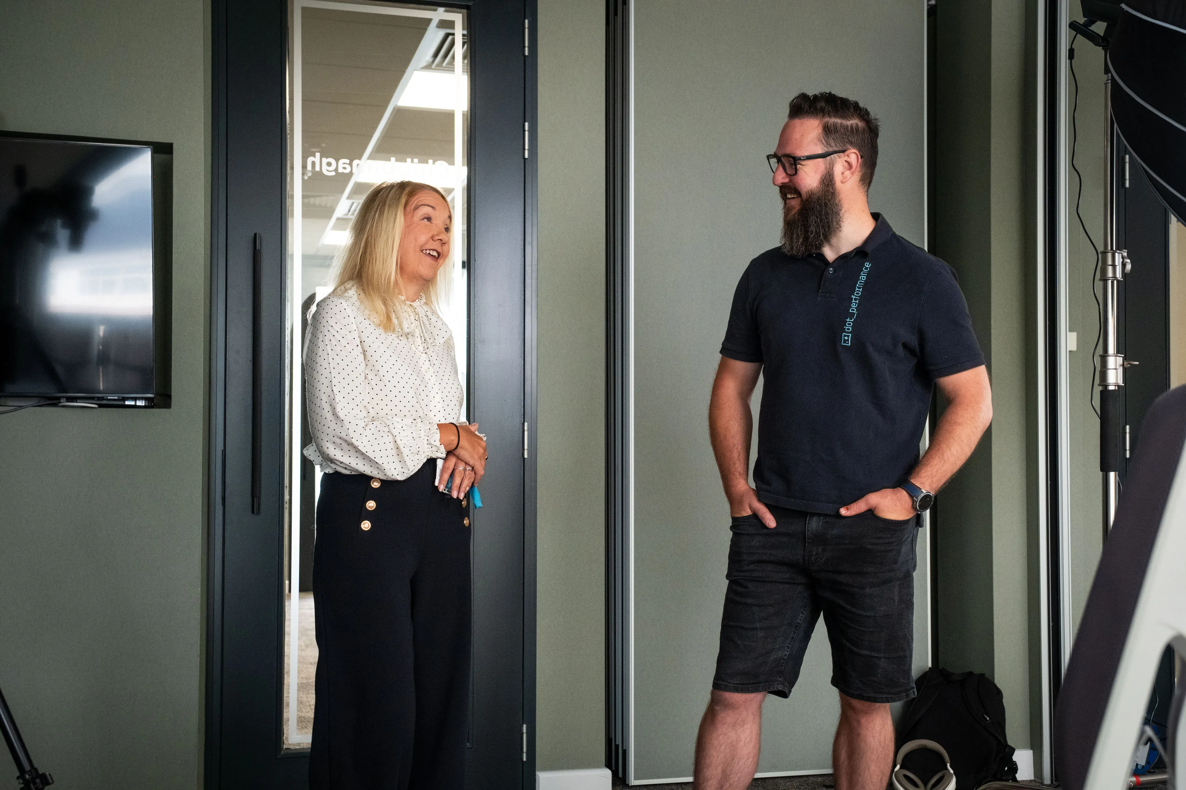 Nico van Loggerenberg having a conversation with Margy Caley during her portrait session at Boal & Co's office.