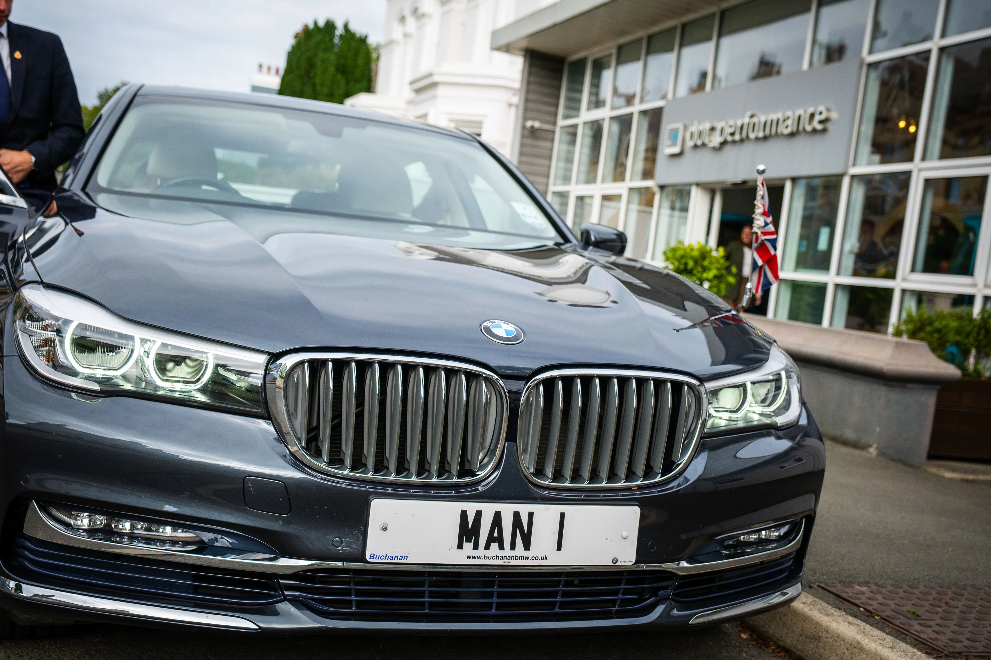 Close-up of the MAN 1 registered car parked outside DotPerformance during Lieutenant General Sir John Lorimer KCB DSO MBE's visit