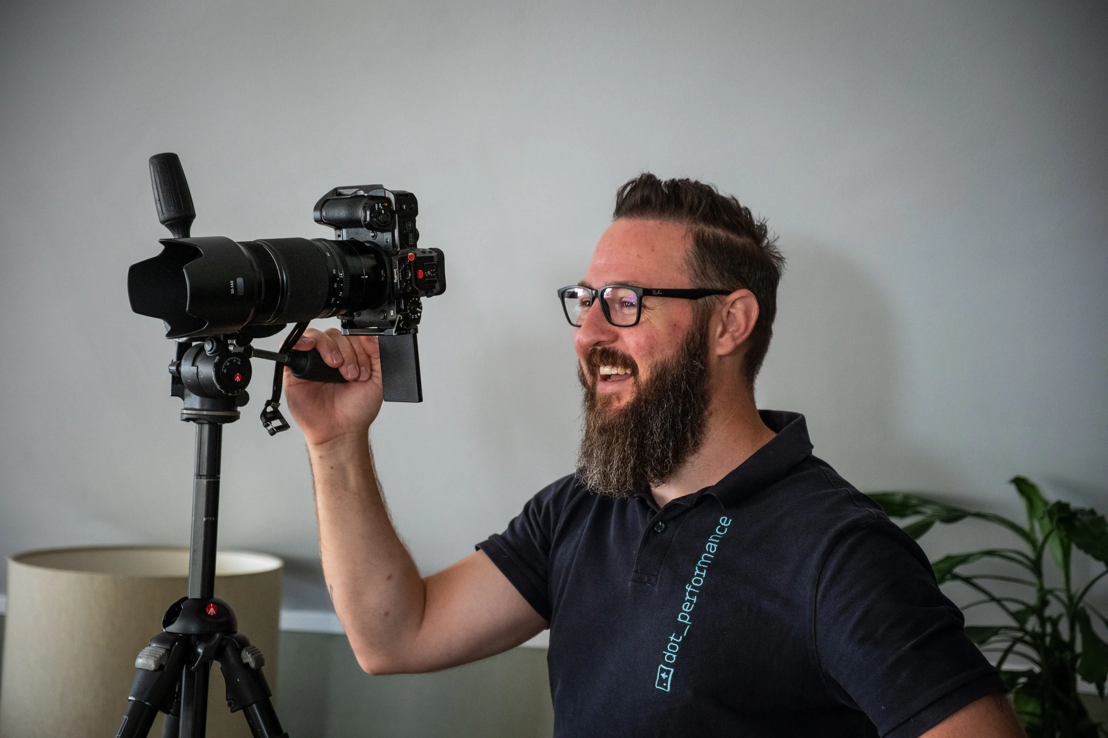 Nico van Loggerenberg smiling at the person he is photographing during the Boal & Co portrait session