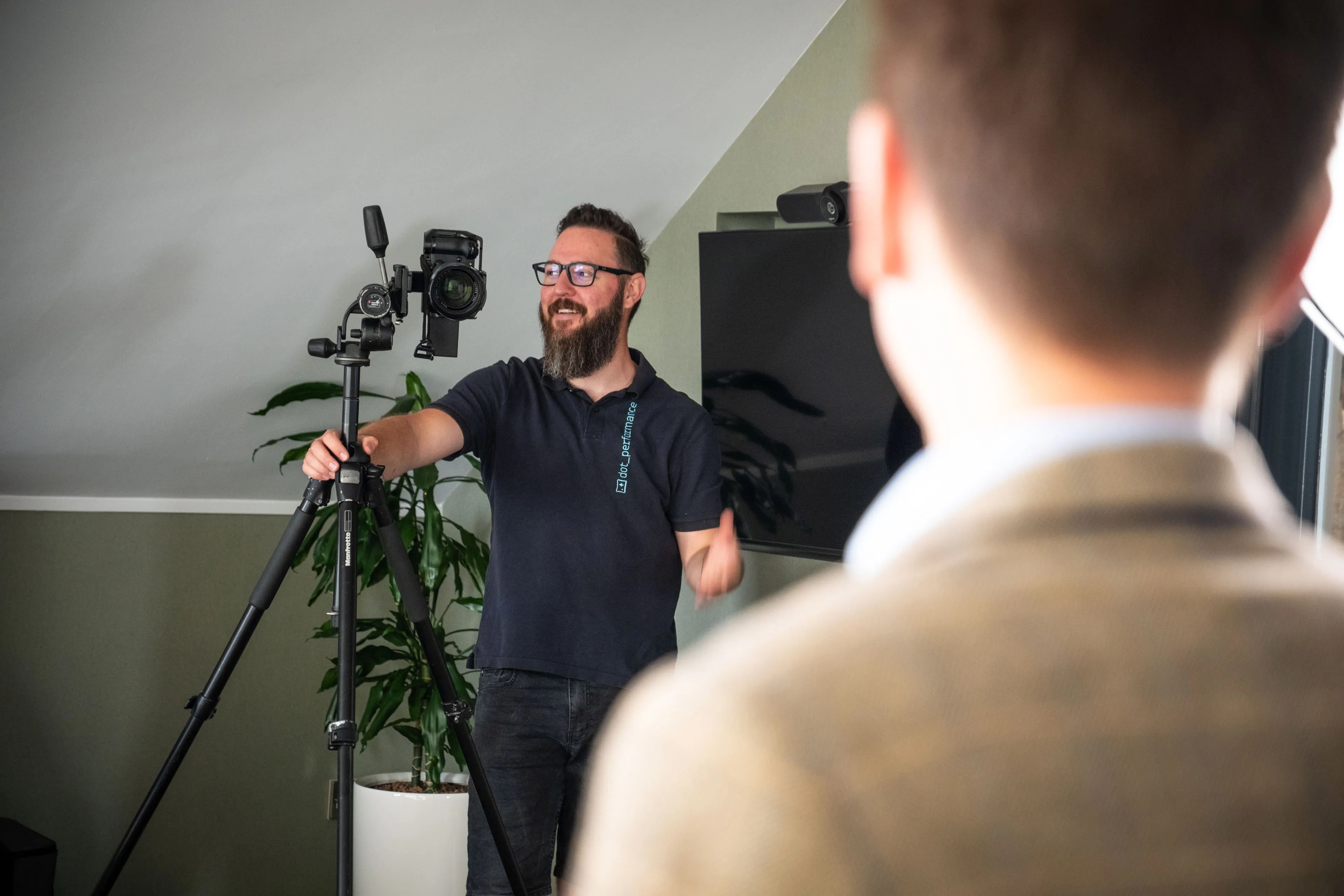 Nico van Loggerenberg discussing poses and ideas with Jordan Hamer during his portrait session at Boal & Co.