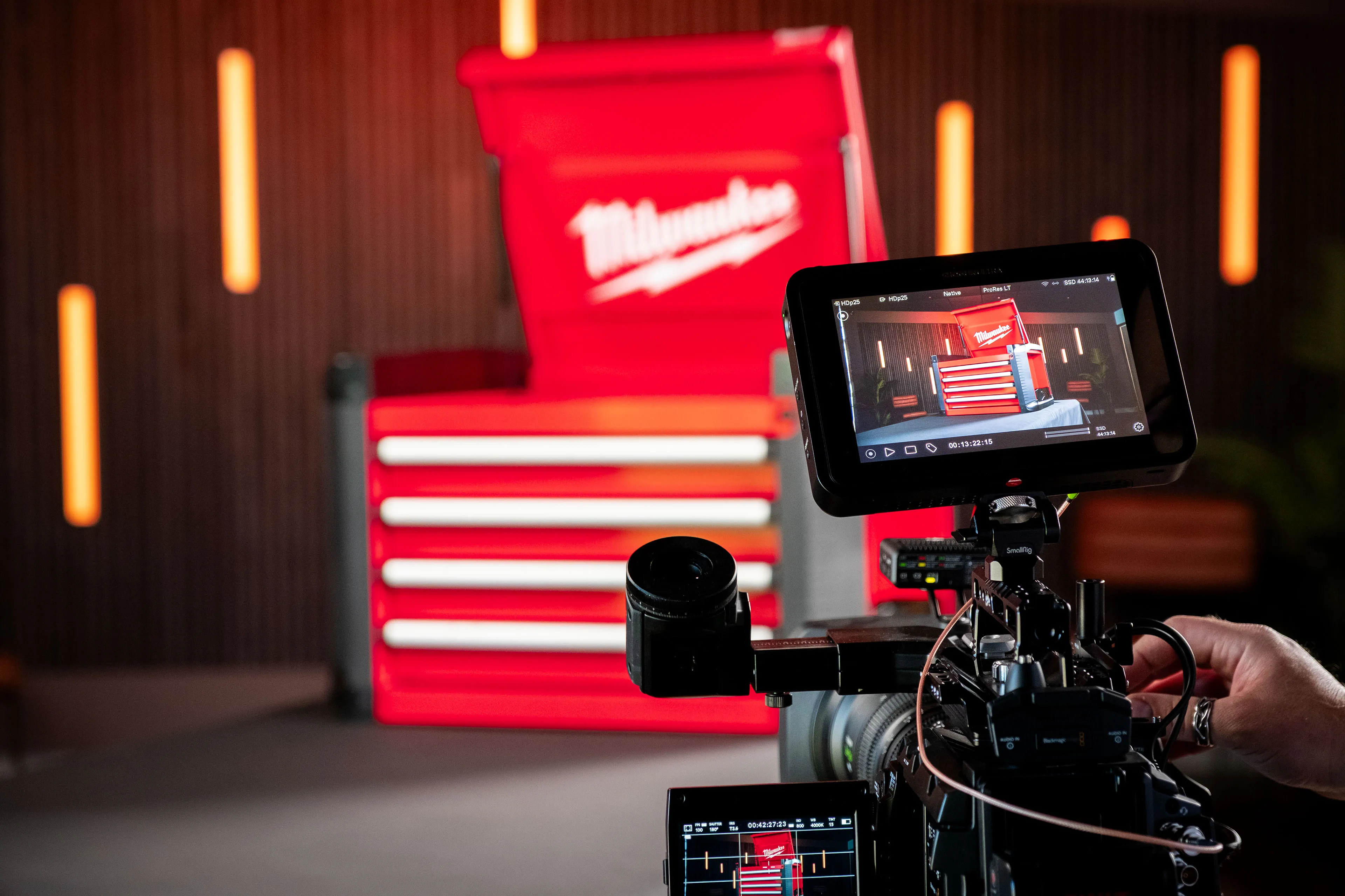 Blackmagic Ursa Mini camera with Fujinon 20-120mm lens and Atomos Shogun Ultra monitor framing the Milwaukee STC30-1 Toolbox prize in the DotPerformance Media Studio